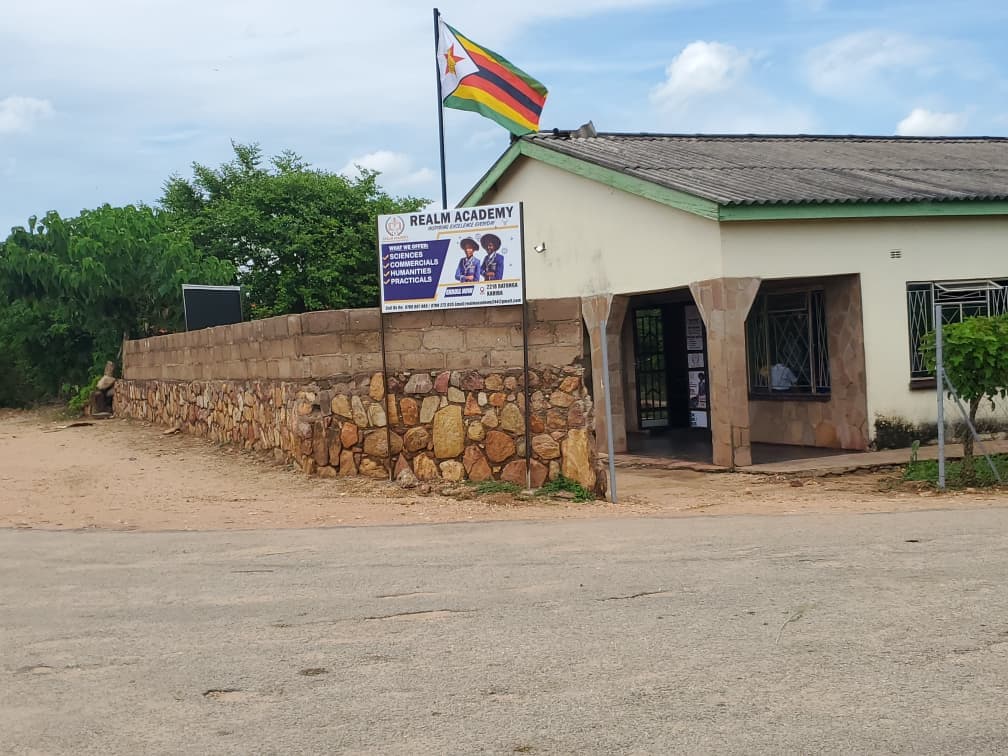 Realm school building, entrance and Zimbabwe flag